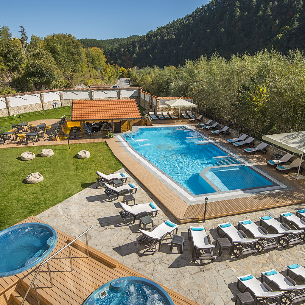 Unique aquatonic outdoor pool with built-in bar amidst the pristine nature surrounding Balneo Hotel Saint Spas Velingrad